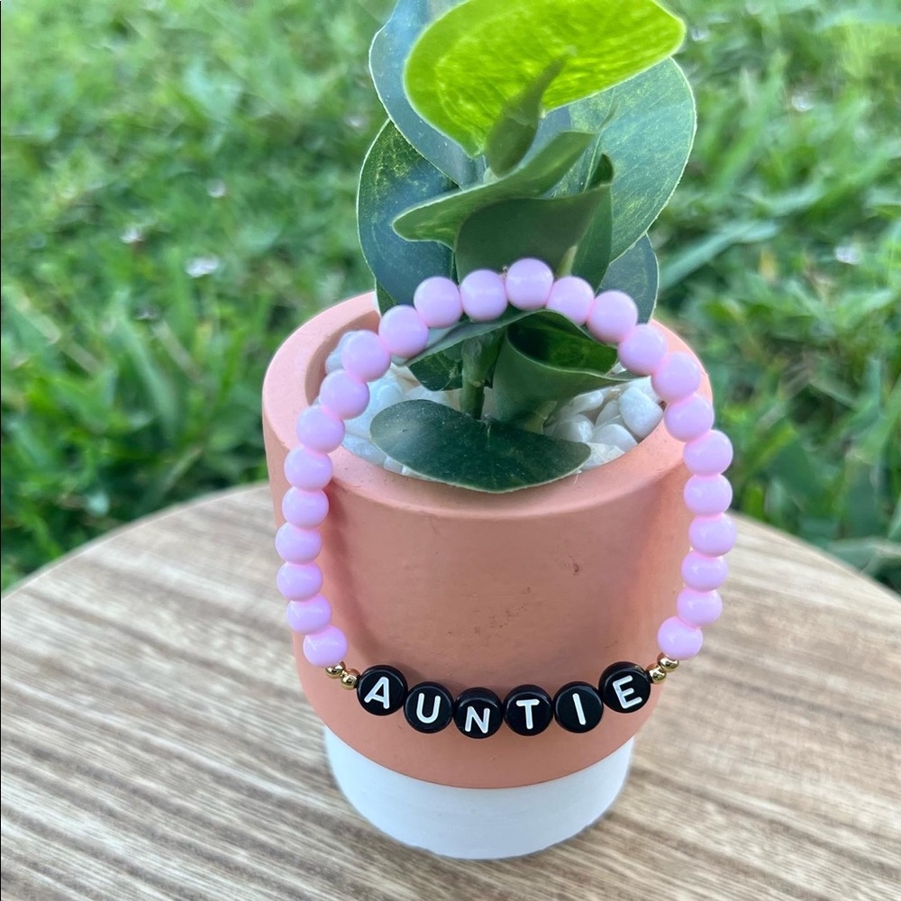 The Baby Pink Bracelet with Gold Spacers and Black Letters🌸